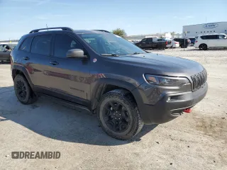 2019 Jeep Cherokee Trailhawk Elite with VIN 1C4PJMBX8KD107404, listed as a Copart auction lot 70588724 with 112,540 mi miles and Salvage Title. Bid and sale history available at carsss.com. Image 4.