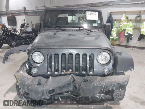 2014 Jeep Wrangler Sport with VIN 1C4AJWAG6EL167579, listed as a IAAI auction lot 41801276 with 137,639 mi miles and . Bid and sale history available at DreamBid. Image 6.