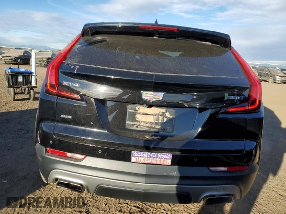 2020 Cadillac XT4 AWD Premium Luxury with VIN 1GYFZDR49LF032597, listed as a Copart auction lot 88595595 with 82,324 mi miles and Salvage title. Bid and sale history available at DreamBid. Image 6.
