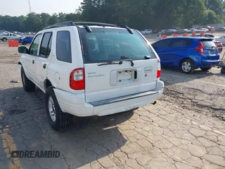 2002 Isuzu Rodeo S with VIN 4S2CK58W524321108, listed as a IAAI auction lot 42352330 with 270,614 mi miles and . Bid and sale history available at DreamBid. Image 3.