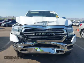 2021 Ram 1500 Laramie with VIN 1C6SRFJT7MN719238, listed as a IAAI auction lot 42482214 with 47,265 mi miles and . Bid and sale history available at DreamBid. Image 6.