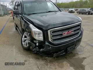 2015 GMC Yukon SLT z VIN 1GKS2BKC1FR112708, wystawiony jako Copart lot #53963165 z przebiegiem 123 331 mil mil oraz Szkoda całkowita • Salvage title. Historia ofert i sprzedaży dostępna na DreamBid. Obrazek 14.