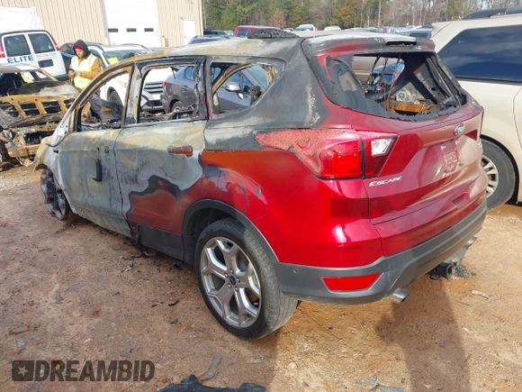 2019 Ford Escape Titanium z VIN 1FMCU9J99KUA72809, wystawiony jako IAAI lot #41588522 z przebiegiem Nie podano mil oraz . Historia ofert i sprzedaży dostępna na DreamBid. Obrazek 3.