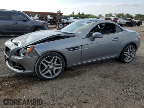 2014 Mercedes-Benz SLK 250 with VIN WDDPK4HA0EF091357, listed as a Copart auction lot 82316804 with 71,993 mi miles and Salvage title. Bid and sale history available at DreamBid. Image 1.