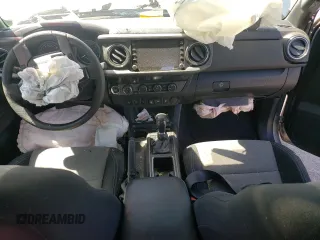 2022 Toyota Tacoma SR with VIN 3TMCZ5AN4NM470997, listed as a Copart auction lot 55165855 with 67,161 mi miles and Salvage title. Bid and sale history available at DreamBid. Image 8.