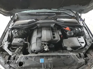 2005 BMW 5 Series 530i z VIN WBANA73555CR58878, wystawiony jako Copart lot #51302875 z przebiegiem 172 745 mil mil oraz Szkoda całkowita • Salvage title. Historia ofert i sprzedaży dostępna na DreamBid. Obrazek 13.