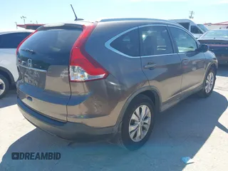 2014 Honda CR-V EX-L with VIN 2HKRM3H74EH514278, listed as a IAAI auction lot 42223596 with 148,477 mi miles and . Bid and sale history available at carsss.com. Image 4.