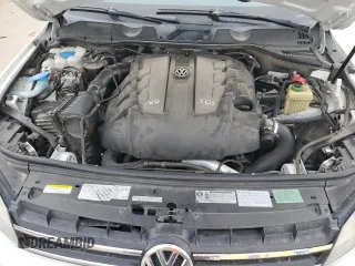 2013 Volkswagen Touareg Sport с VIN WVGEP9BP9DD003974, выставлен на аукционе Copart как лот 75106234 с пробегом 211 323 миль миль и Чистый • Clean title. История ставок и продаж доступна на DreamBid. Изображение 12.