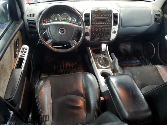 2007 Mercury Mariner Luxury with VIN 4M2YU91127KJ08616, listed as a Copart auction lot 42007945 with 196,691 mi miles and Salvage title. Bid and sale history available at DreamBid. Image 8.