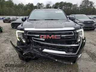 2023 GMC Yukon SLT with VIN 1GKS2BKD7PR122685, listed as a Copart auction lot 84611444 with 52,271 mi miles and Salvage Title. Bid and sale history available at carsss.com. Image 5.