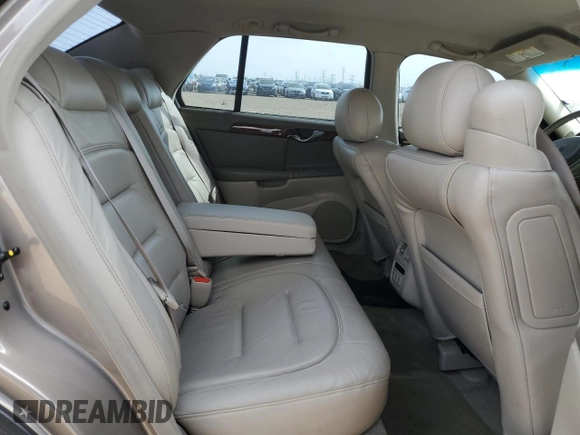 2001 Cadillac DeVille z VIN 1G6KD54YX1U242656, wystawiony jako Copart lot #54566105 z przebiegiem 200 016 mil mil oraz Szkoda całkowita • Salvage title. Historia ofert i sprzedaży dostępna na DreamBid. Obrazek 10.