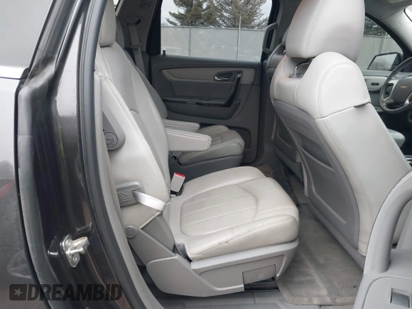 2015 Chevrolet Traverse LTZ with VIN 1GNKVJKD5FJ341677, listed as a IAAI auction lot 41632340 with 173,711 mi miles and . Bid and sale history available at DreamBid. Image 8.