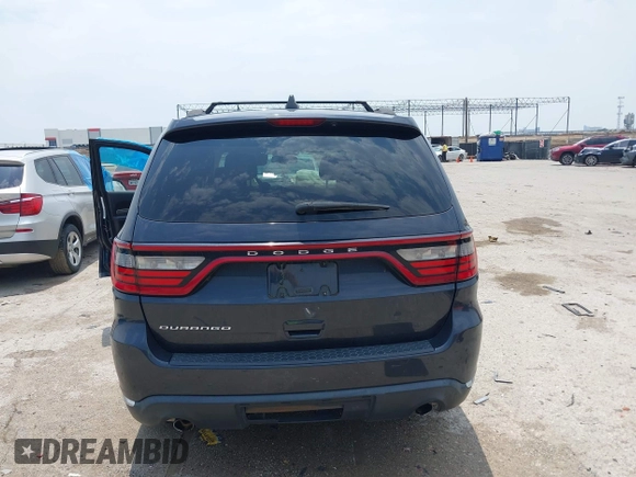2014 Dodge Durango SXT with VIN 1C4RDHAG3EC560851, listed as a IAAI auction lot 42282572 with Not provided miles and . Bid and sale history available at DreamBid. Image 17.