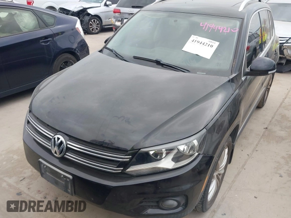 2012 Volkswagen Tiguan SE with VIN WVGAV7AX9CW611202, listed as a IAAI auction lot 41944210 with 118,002 mi miles and . Bid and sale history available at DreamBid. Image 6.