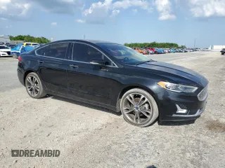 2019 Ford Fusion Titanium with VIN 3FA6P0D97KR184134, listed as a Copart auction lot 50913245 with 128,888 mi miles and Clean Title. Bid and sale history available at carsss.com. Image 4.