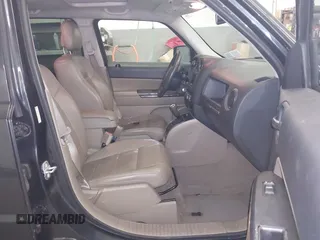 2014 Jeep Patriot Limited with VIN 1C4NJRCB7ED684811, listed as a IAAI auction lot 41833010 with 74,820 mi miles and . Bid and sale history available at carsss.com. Image 5.