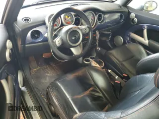 2005 MINI Convertible with VIN WMWRF33485TG10496, listed as a Copart auction lot 58582955 with 107,641 mi miles and Salvage title. Bid and sale history available at DreamBid. Image 8.