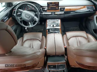 2014 Audi A8 3.0T z VIN WAURGAFD3EN003758, wystawiony jako Copart lot #47636885 z przebiegiem 166 990 mil mil oraz Szkody całkowita. Historia ofert i sprzedaży dostępna na DreamBid. Obrazek 8.