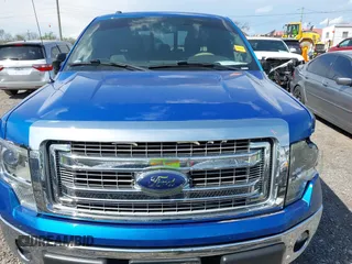 2014 Ford F-150 XL with VIN 1FTFW1CF4EKF14279, listed as a IAAI auction lot 42006454 with 104,648 mi miles. Bid and sale history available at carsss.com. Image 12.