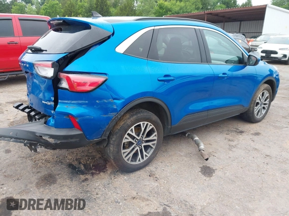 2021 Ford Escape SEL z VIN 1FMCU9H6XMUA63812, wystawiony jako IAAI lot #42418390 z przebiegiem 88 263 mil mil oraz . Historia ofert i sprzedaży dostępna na DreamBid. Obrazek 4.