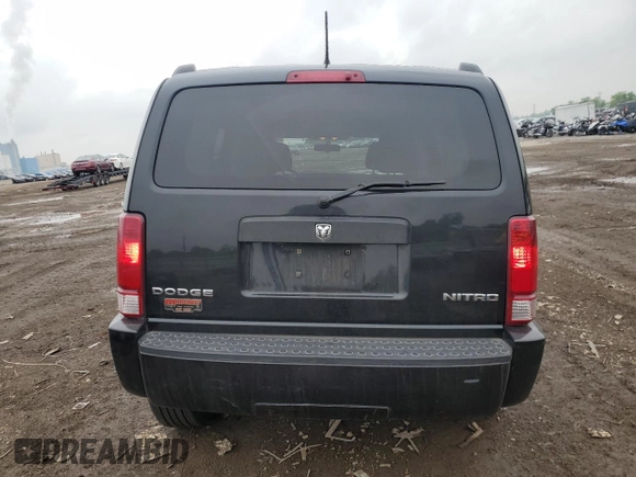 2011 Dodge Nitro Heat with VIN 1D4PT4GK7BW597557, listed as a Copart auction lot 58973335 with 180,958 mi miles and Salvage title. Bid and sale history available at DreamBid. Image 6.