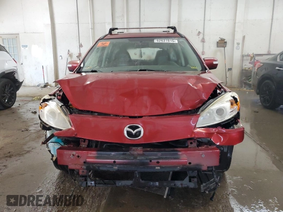 2014 Mazda 5 Sport z VIN JM1CW2BL1E0164721, wystawiony jako Copart lot #62631915 z przebiegiem 111 725 mil mil oraz Szkoda całkowita • Salvage title. Historia ofert i sprzedaży dostępna na DreamBid. Obrazek 5.