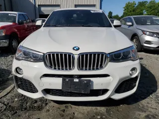 2016 BMW X4 xDrive28i with VIN 5UXXW3C54G0R19353, listed as a Copart auction lot 57747684 with 92,249 mi miles and Clean Title. Bid and sale history available at carsss.com. Image 5.