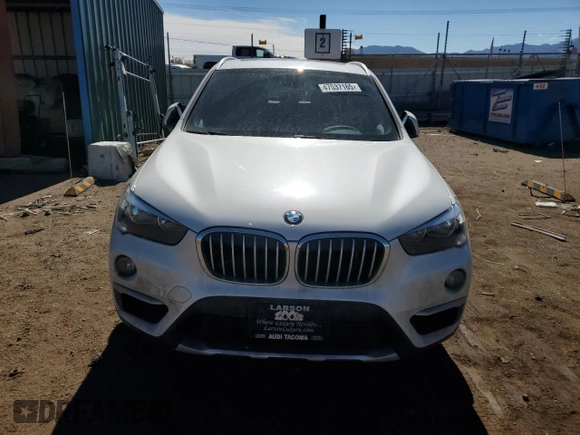 2018 BMW X1 xDrive28i z VIN WBXHT3C35J5K29010, wystawiony jako Copart lot #47537165 z przebiegiem 90 779 mil mil oraz Szkoda całkowita • Salvage title. Historia ofert i sprzedaży dostępna na DreamBid. Obrazek 5.