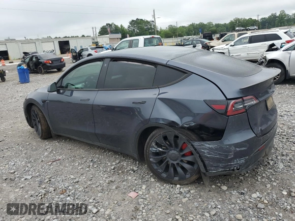 2022 Tesla Model Y Performance with VIN 7SAYGDEF7NF507184, listed as a Copart auction lot 58329875 with 98,320 mi miles and Salvage title. Bid and sale history available at DreamBid. Image 2.