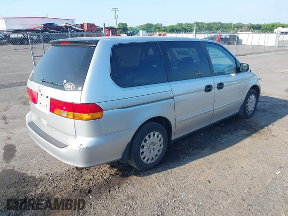 2004 Honda Odyssey LX with VIN 5FNRL18534B007617, listed as a IAAI auction lot 42687524 with 220,079 mi miles and . Bid and sale history available at DreamBid. Image 4.