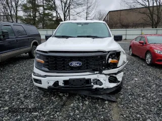 2024 Ford F-150 STX with VIN 1FTEW2LP0RKD27766, listed as a Copart auction lot 52286875 with 9,880 mi miles and Salvage Title. Bid and sale history available at carsss.com. Image 5.