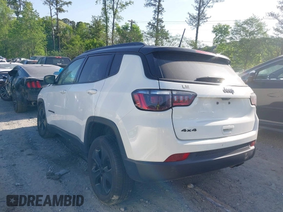 2021 Jeep Compass Altitude with VIN 3C4NJDBB2MT596181, listed as a IAAI auction lot 42026716 with 69,526 mi miles and . Bid and sale history available at DreamBid. Image 3.