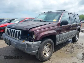 1997 Jeep Grand Cherokee Laredo with VIN 1J4GZ58S4VC702040, listed as a IAAI auction lot 42165536 with 121,803 mi miles and . Bid and sale history available at DreamBid. Image 18.