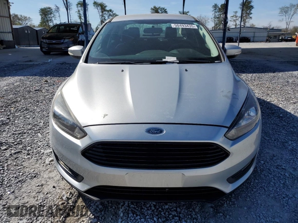 2017 Ford Focus SE with VIN 1FADP3FE0HL336863, listed as a Copart auction lot 50493435 with 64,451 mi miles and Clean Title. Bid and sale history available at DreamBid. Image 5.