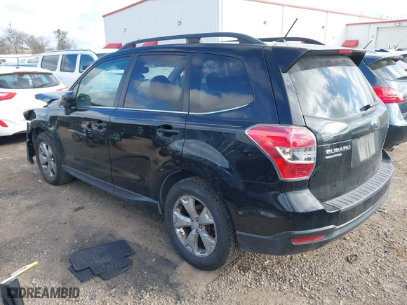 2014 Subaru Forester 2.5i Limited with VIN JF2SJAHC6EH460879, listed as a IAAI auction lot 41673548 with 114,950 mi miles. Bid and sale history available at carsss.com. Image 3.