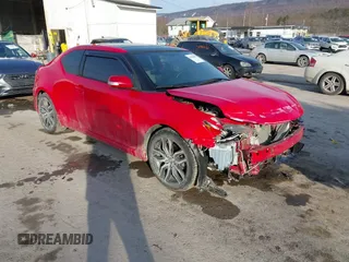 2016 Scion tC z VIN JTKJF5C71GJ022367, wystawiony jako IAAI lot #41428803 z przebiegiem 83 456 mil mil oraz . Historia ofert i sprzedaży dostępna na DreamBid. Obrazek 1.