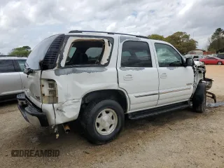 2005 GMC Yukon SLT with VIN 1GKEC13Z45J204402, listed as a Copart auction lot 51697595 with 242,881 mi miles and Salvage Title. Bid and sale history available at carsss.com. Image 3.