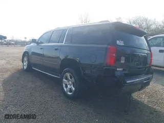 2015 Chevrolet Suburban LTZ with VIN 1GNSKKKC4FR635949, listed as a IAAI auction lot 41796028 with 172,818 mi miles. Bid and sale history available at carsss.com. Image 3.