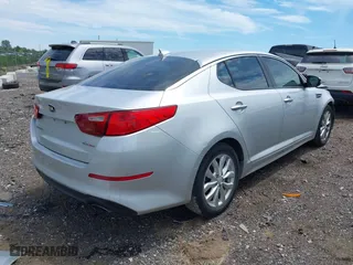 2014 Kia Optima EX with VIN 5XXGN4A79EG339431, listed as a IAAI auction lot 39792297 with 101,446 mi miles. Bid and sale history available at carsss.com. Image 4.