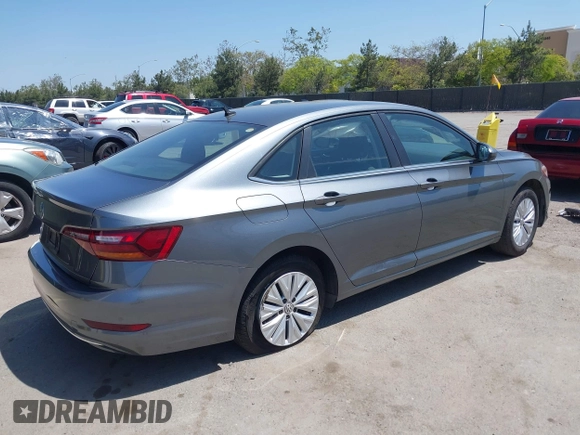 2019 Volkswagen Jetta S z VIN 3VWC57BUXKM074708, wystawiony jako IAAI lot #42151448 z przebiegiem 189 430 mil mil oraz . Historia ofert i sprzedaży dostępna na DreamBid. Obrazek 4.