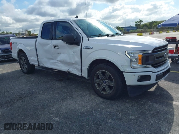2020 Ford F-150 XL with VIN 1FTEX1CP4LKE56026, listed as a IAAI auction lot 41196057 with 92,828 mi miles and . Bid and sale history available at DreamBid. Image 1.