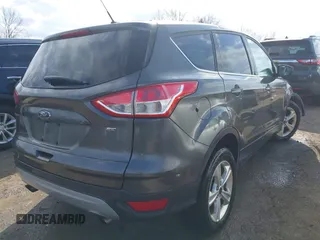 2016 Ford Escape SE with VIN 1FMCU0G78GUA20032, listed as a IAAI auction lot 41853044 with 117,005 mi miles. Bid and sale history available at carsss.com. Image 4.
