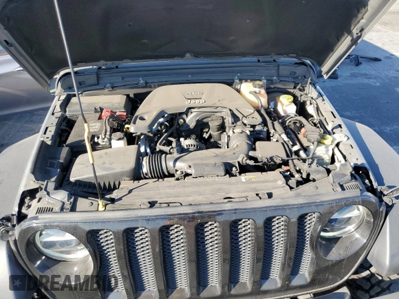 2020 Jeep Wrangler Unlimited Willys with VIN 1C4HJXDG5LW348507, listed as a Copart auction lot 77000574 with 57,056 mi miles and Salvage title. Bid and sale history available at DreamBid. Image 12.