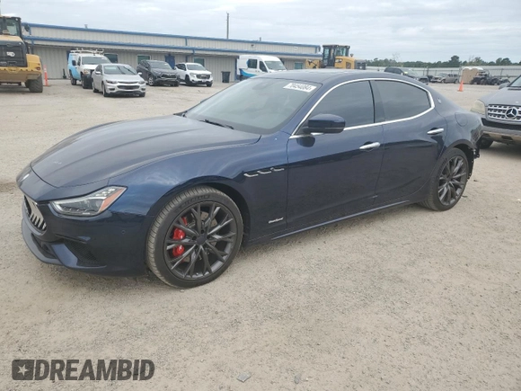 2019 Maserati Ghibli with VIN ZAM57XSS3K1319197, listed as a Copart auction lot 70454084 with 28,584 mi miles and Salvage Title. Bid and sale history available at carsss.com. Image 1.