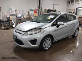 2011 Ford Fiesta SE with VIN 3FADP4EJ8BM138140, listed as a IAAI auction lot 41858510 with 38,475 mi miles. Bid and sale history available at carsss.com. Image 2.