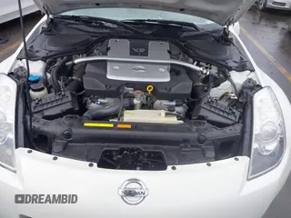 2007 Nissan 350Z Enthusiast z VIN JN1BZ34D17M501594, wystawiony jako IAAI lot #42256549 z przebiegiem Nie podano mil oraz . Historia ofert i sprzedaży dostępna na DreamBid. Obrazek 10.