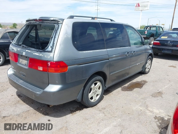 2000 Honda Odyssey EX with VIN 2HKRL1864YH605537, listed as a IAAI auction lot 41972983 with 203,500 mi miles and . Bid and sale history available at DreamBid. Image 4.