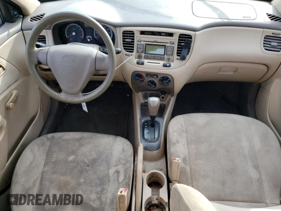 2009 Kia Rio LX with VIN KNADE223296470687, listed as a Copart auction lot 48385925 with 176,400 mi miles and Salvage Title. Bid and sale history available at DreamBid. Image 8.