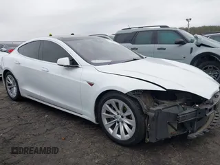 2016 Tesla Model S 90D with VIN 5YJSA1E26GF155962, listed as a IAAI auction lot 41348998 with 134,269 mi miles and . Bid and sale history available at DreamBid. Image 13.