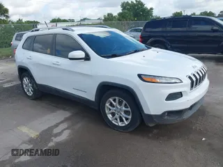 2014 Jeep Cherokee Latitude z VIN 1C4PJLCB6EW101834, wystawiony jako IAAI lot #42473492 z przebiegiem 71 495 mil mil oraz . Historia ofert i sprzedaży dostępna na DreamBid. Obrazek 1.